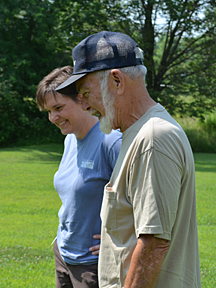 Boone County Stormwater Coordinator Georganne Bowman (left) observes progress on the installation of the climate station with Sunrise Estates Homeowners Association President Bob Tripp